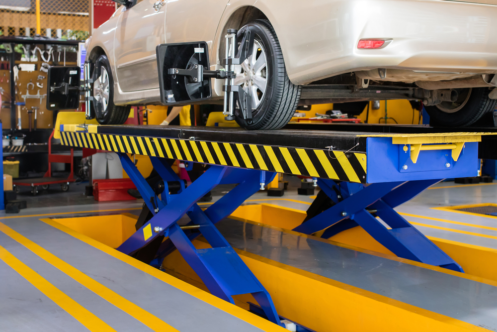 Step-By-Step Guide To Safely Lift A Car Using An Underground Car Lift Table